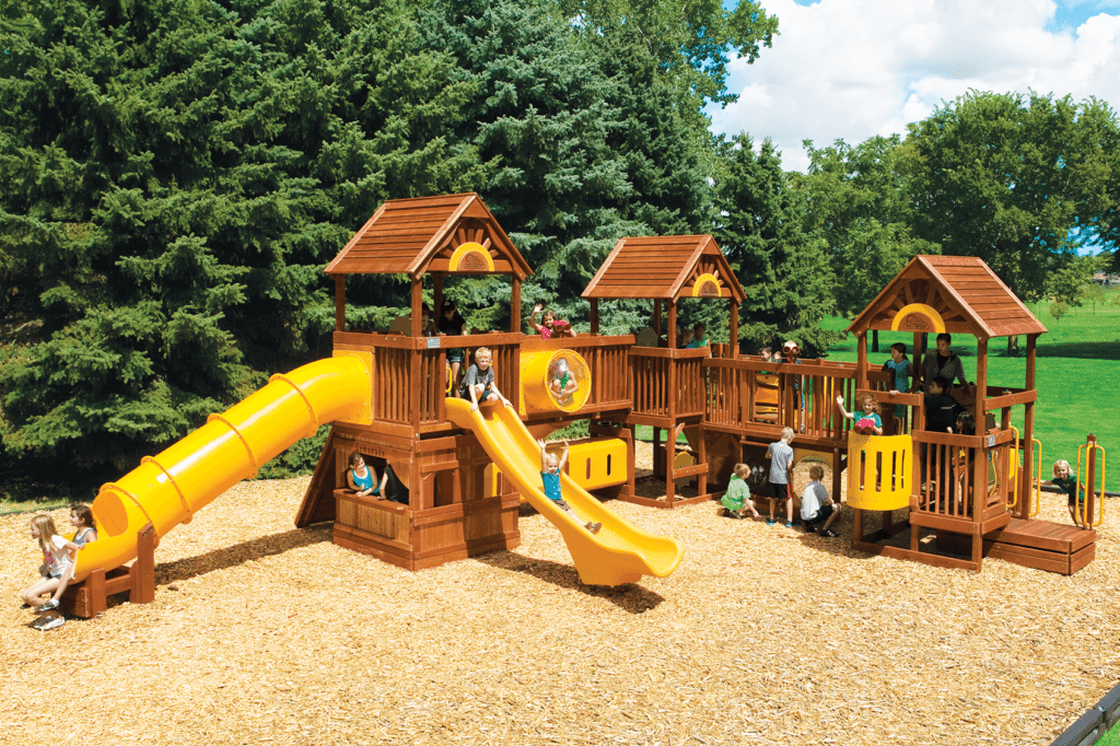 kids playing on a commercial playground 