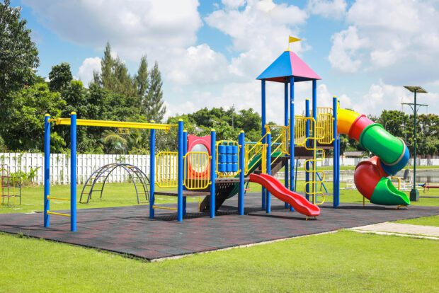 Colorful playground on yard in the park