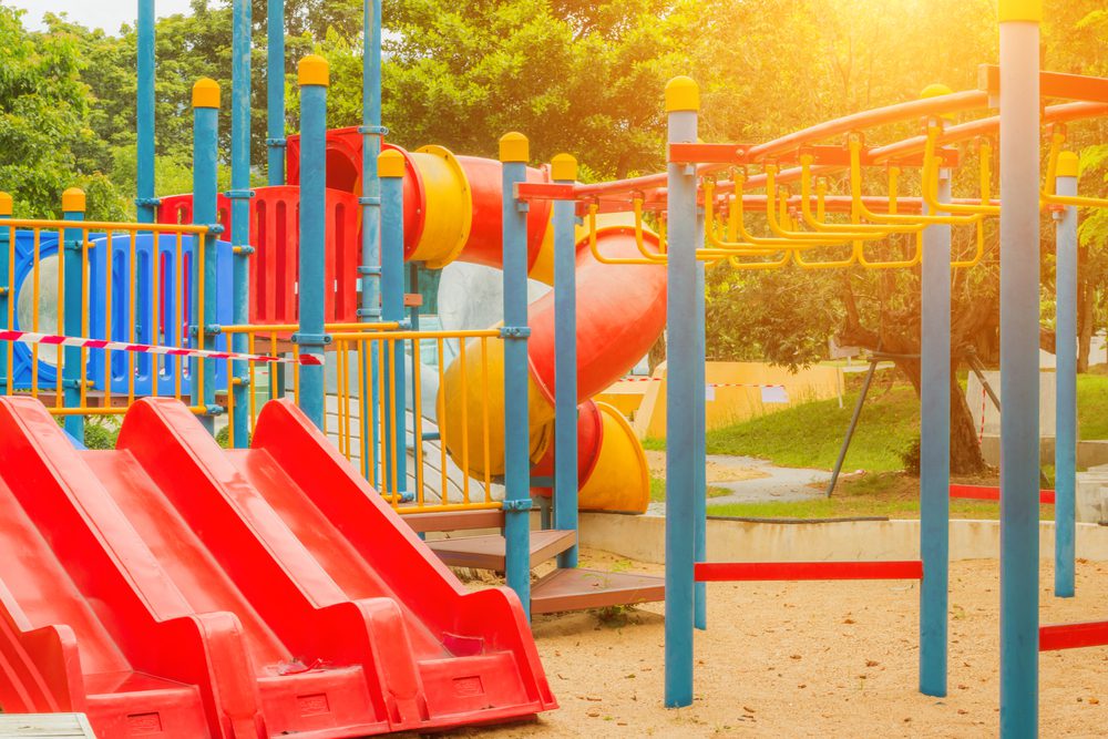 A children's playground on a sunny day sits as Backyard Fun Zone informs consumers how to go about purchasing a swingset for their home